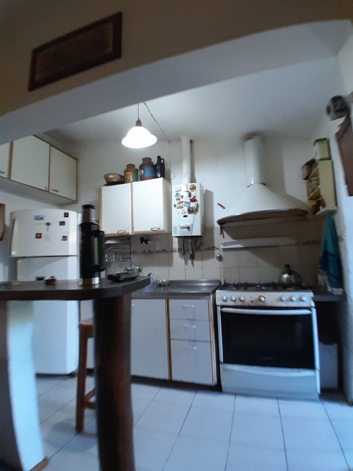 VENDE CASA CON QUINCHO 