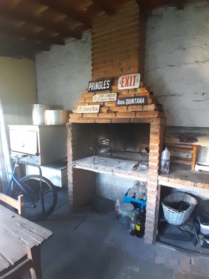 VENDE CASA CON QUINCHO 